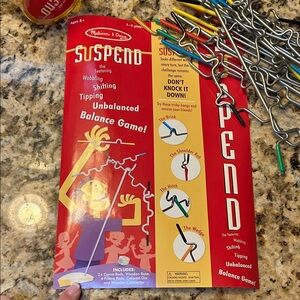 Melissa & Doug Suspend Balance Game - Red and Yellow